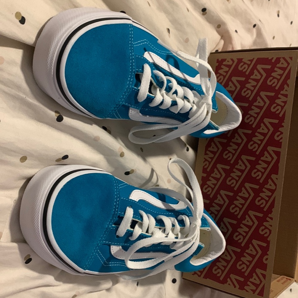 The vans or more teal than what it looks like in the picture